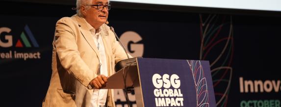 José Luis Curbelo, chairman and CEO of COFIDES, speaking at the Impact Summit. 